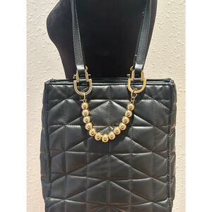 Women's ZARA Black Quilted Tote Bag with Gold Accents
10w x 11h x 2.75. 11” star